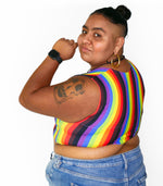 Person wearing More Color More Pride Binder, with Rainbow, Black and Brown vertical stripes.