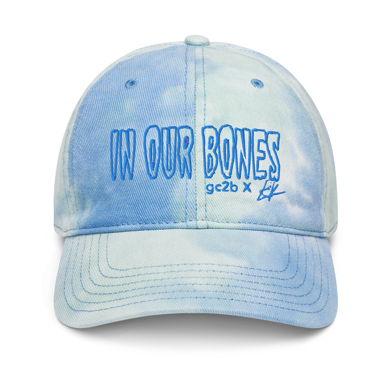 tie-dye embroidered hat features "in our bones" logo design